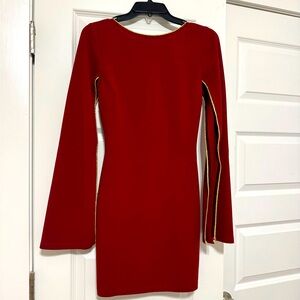 Valiant red with gold trim dress.